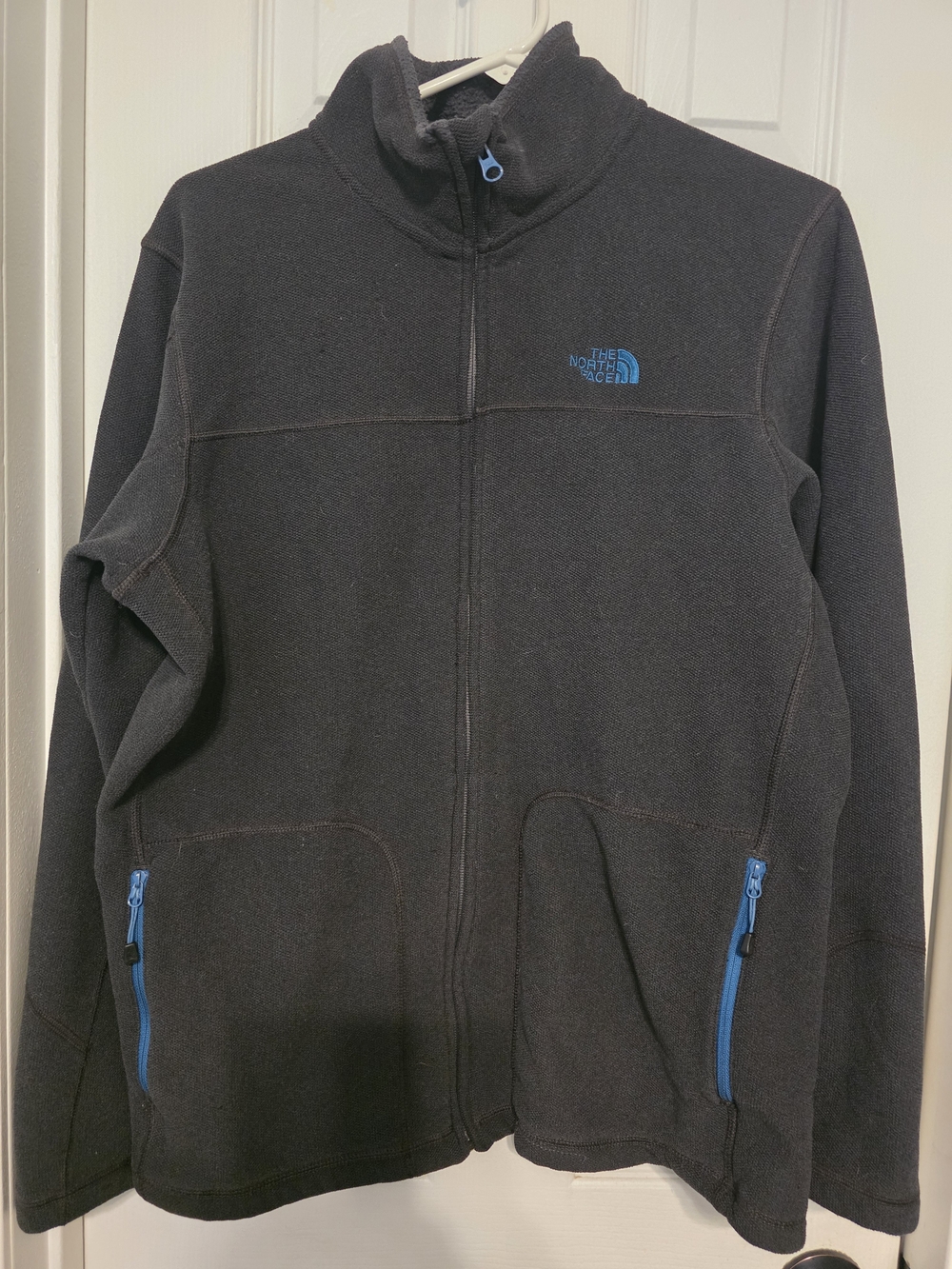 The North Face Black Fleece Jacket with Blue Logo Accents